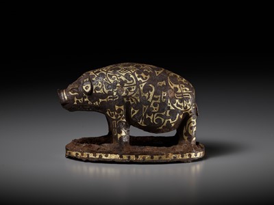 Lot 66 - A GOLD AND SILVER-INLAID IRON FIGURE OF A PIG, WARRING STATES PERIOD TO HAN DYNASTY