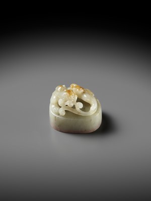 Lot 103 - A CELADON AND RUSSET ‘CHILONG’ JADE SEAL, JIANGUTANG (HALL OF APPRAISAL OF ANTIQUITIES), ATTRIBUTED TO ZHAO ZHIQUAN (1829-1884)