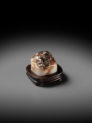 Lot 102 - A PALE GRAY AND RUSSET JADE ‘CHILONG’ SEAL OF THE KING OF ZHONGSHAN, WESTERN HAN DYNASTY