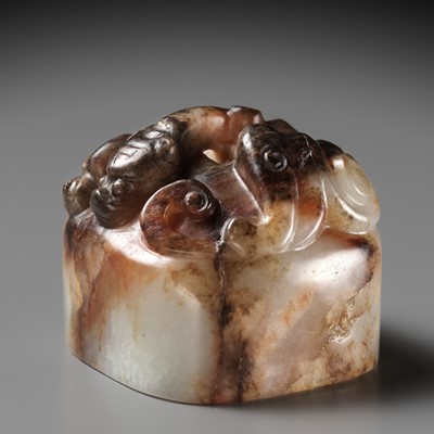 Lot 102 - A PALE GRAY AND RUSSET JADE ‘CHILONG’ SEAL OF THE KING OF ZHONGSHAN, WESTERN HAN DYNASTY