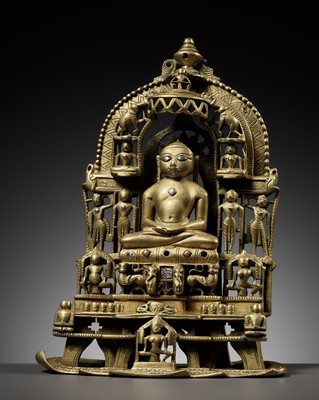 Lot 337 - A JAIN SILVER AND COPPER-INLAID BRASS SHRINE OF TIRTHANKARA ANANTANATHA, DATED 1434