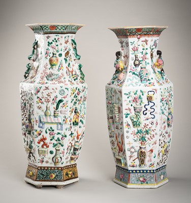 Lot 1293 - A PAIR OF MOLDED ‘HUNDRED ANTIQUES’ FAMILLE ROSE PORCELAIN VASES, 19TH CENTURY