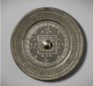 Lot 75 - AN INSCRIBED SILVERY BRONZE ‘TLV’ MIRROR, WESTERN HAN DYNASTY