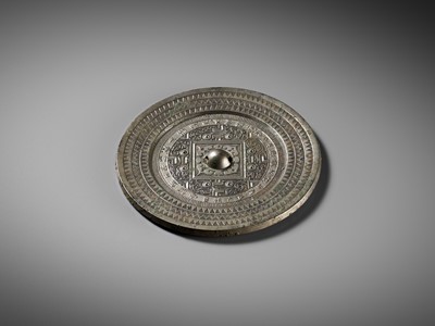 Lot 75 - AN INSCRIBED SILVERY BRONZE ‘TLV’ MIRROR, WESTERN HAN DYNASTY