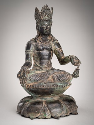 Lot 996 - A SILVER-INLAID BRONZE FIGURE OF AKSHOBHYA, SWAT VALLEY STYLE