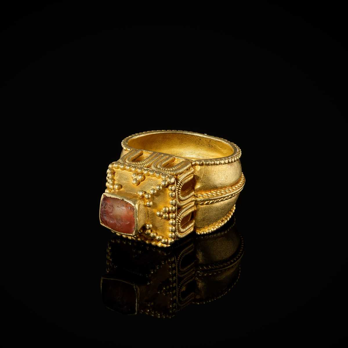 Merovingian Rings Lot 612 - A MEROVINGIAN GOLD ARCHITECTURAL RING WITH A