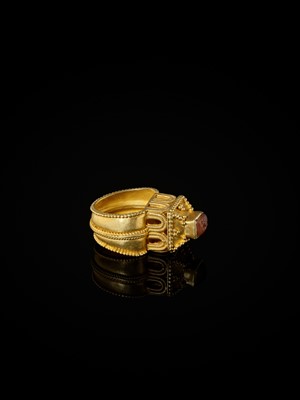 Lot 612 - A MEROVINGIAN GOLD ARCHITECTURAL RING WITH A GLASS INTAGLIO OF A RAM