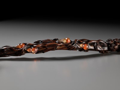 Lot 376 - A RARE CARNELIAN-EMBELLISHED ZITAN RUYI SCEPTER, 18TH-19TH CENTURY
