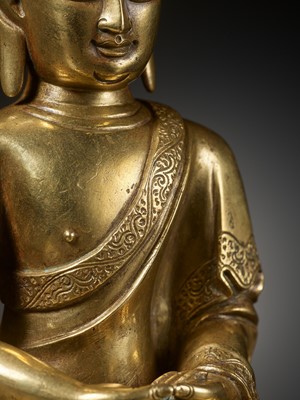Lot 52 - AN EXCEEDINGLY RARE GILT BRONZE FIGURE OF AMITABHA BUDDHA, BY CHEN YIDE, QIANTANG c. 1400-1450
