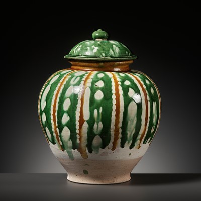 Lot 137 - A SANCAI-GLAZED OVOID JAR AND COVER, WAN NIAN, TANG DYNASTY