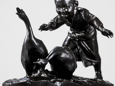 Lot 139 - MASAAKI: A MASSIVE TOKYO SCHOOL BRONZE OKIMONO OF A BOY CHASING GEESE