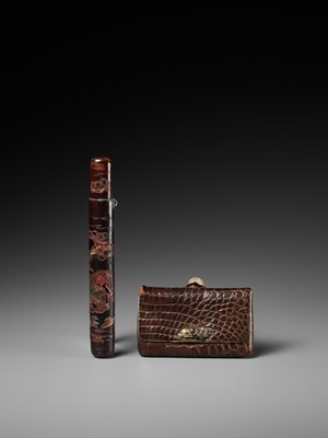 Lot 352 - A LACQUER KISERUZUTSU, WITH EN SUITE LEATHER POUCH AND MARBLE OJIME