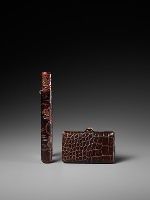 Lot 352 - A LACQUER KISERUZUTSU, WITH EN SUITE LEATHER POUCH AND MARBLE OJIME