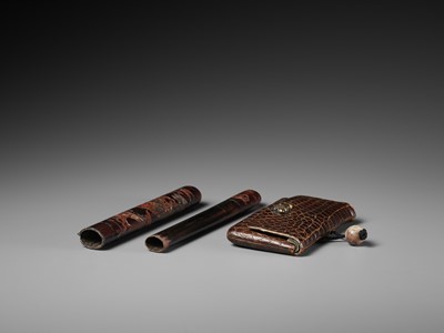 Lot 352 - A LACQUER KISERUZUTSU, WITH EN SUITE LEATHER POUCH AND MARBLE OJIME
