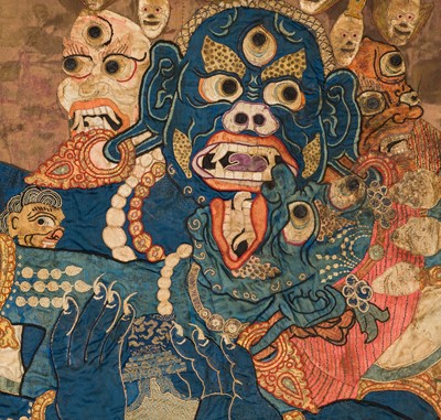 Lot 29 - A LARGE AND DRAMATIC SILK APPLIQUÉ OF VAJRAKILAYA WITH CONSORT, TIBET, 18TH CENTURY