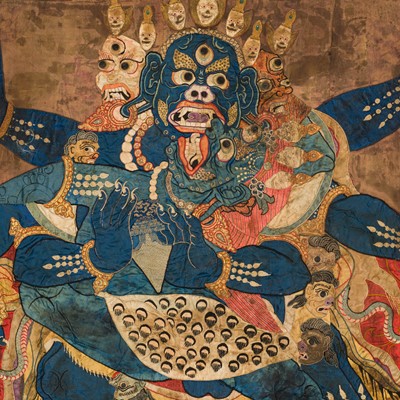 Lot 29 - A LARGE AND DRAMATIC SILK APPLIQUÉ OF VAJRAKILAYA WITH CONSORT, TIBET, 18TH CENTURY