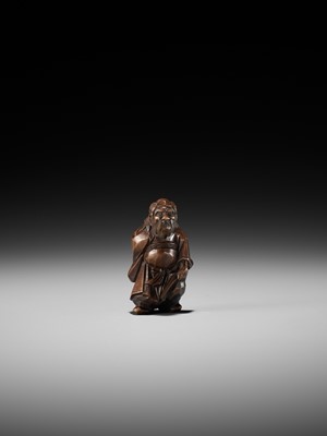 Lot 369 - A FINE ITTOBORI WOOD NETSUKE OF SHOKI, CARVED FOR THE TANGO-NO-SEKKU FESTIVAL