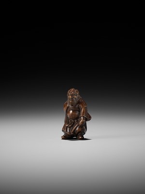 Lot 369 - A FINE ITTOBORI WOOD NETSUKE OF SHOKI, CARVED FOR THE TANGO-NO-SEKKU FESTIVAL