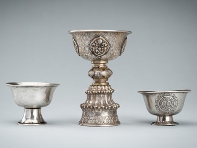 Lot 1063 - A LOT WITH THREE SILVER BUTTER LAMPS
