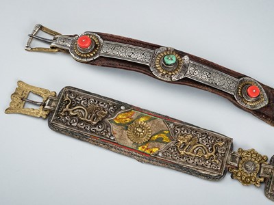 Lot 1048 - A GROUP OF TWO TIBETAN BELTS WITH METAL FITTINGS AND PRECIOUS STONE INLAYS, 19TH CENTURY