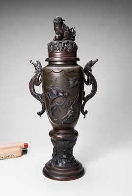 A LARGE BRONZE KORO (CENSER) AND COVER WITH DRAGONS AND LION