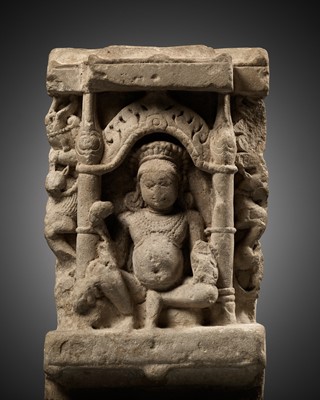 Lot 1609 - A SANDSTONE FRIEZE DEPICTING KUBERA, CENTRAL INDIA, 9TH-11TH CENTURY