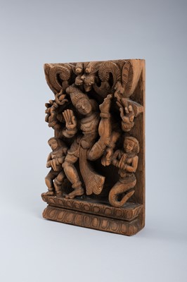 Lot 1635 - AN INDIAN WOOD RELIEF OF DANCING VISHNU