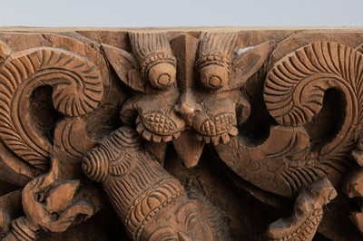 Lot 1635 - AN INDIAN WOOD RELIEF OF DANCING VISHNU