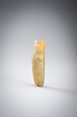 Lot 811 - A PALE-YELLOW JADE ‘BEETLE’ PENDANT, POSSIBLY SHANG DYNASTY