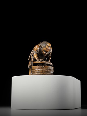 Lot 488 - HOKYUDO ITSUMIN: A FINE NETSUKE-OKIMONO OF SHOKI AND ONI