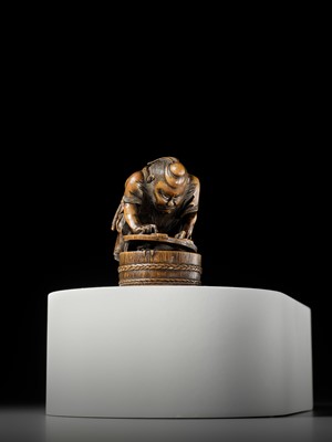 Lot 488 - HOKYUDO ITSUMIN: A FINE NETSUKE-OKIMONO OF SHOKI AND ONI