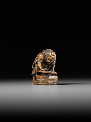 Lot 488 - HOKYUDO ITSUMIN: A FINE NETSUKE-OKIMONO OF SHOKI AND ONI