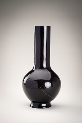 A TRANSLUCENT RUBY-RED GLASS BOTTLE VASE, QIANLONG MARK AND PERIOD