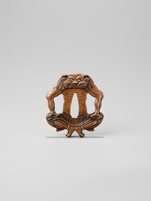 Lot 250 - A SUAKA (REFINED COPPER) TSUBA IN THE FORM OF ONI, ATTRIBUTED TO NARA MASAYOSHI