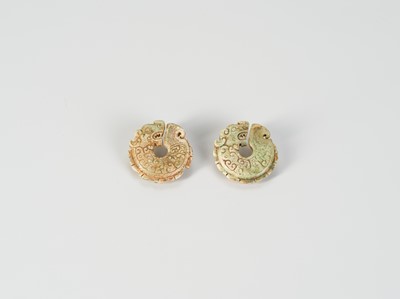 A PAIR OF ARCHAISTIC ‘DRAGON’ PENDANTS, QING OR EARLIER