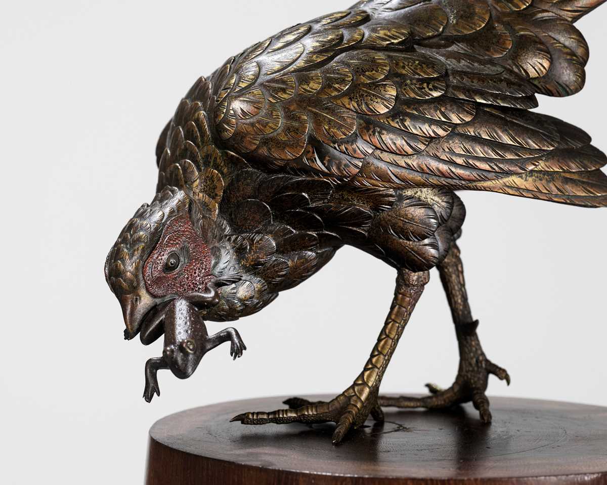 Lot 128 - AKASOFU GYOKKO: A FINE BRONZE OKIMONO OF A PHEASANT AND FROG