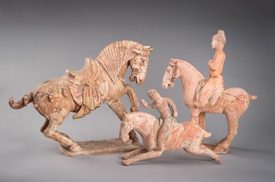 Lot 1187 - A GROUP OF THREE TERRACOTTA EQUESTRIANS AND HORSES, TANG DYNASTY