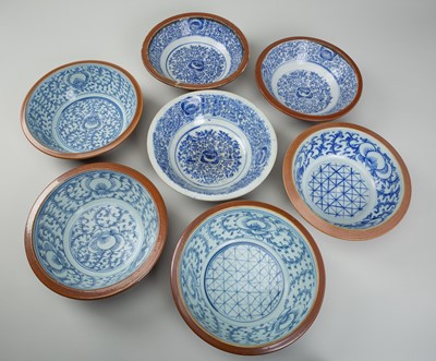 Lot 1292 - A GROUP OF SEVEN BLUE AND WHITE PORCELAIN BOWLS, 19TH CENTURY