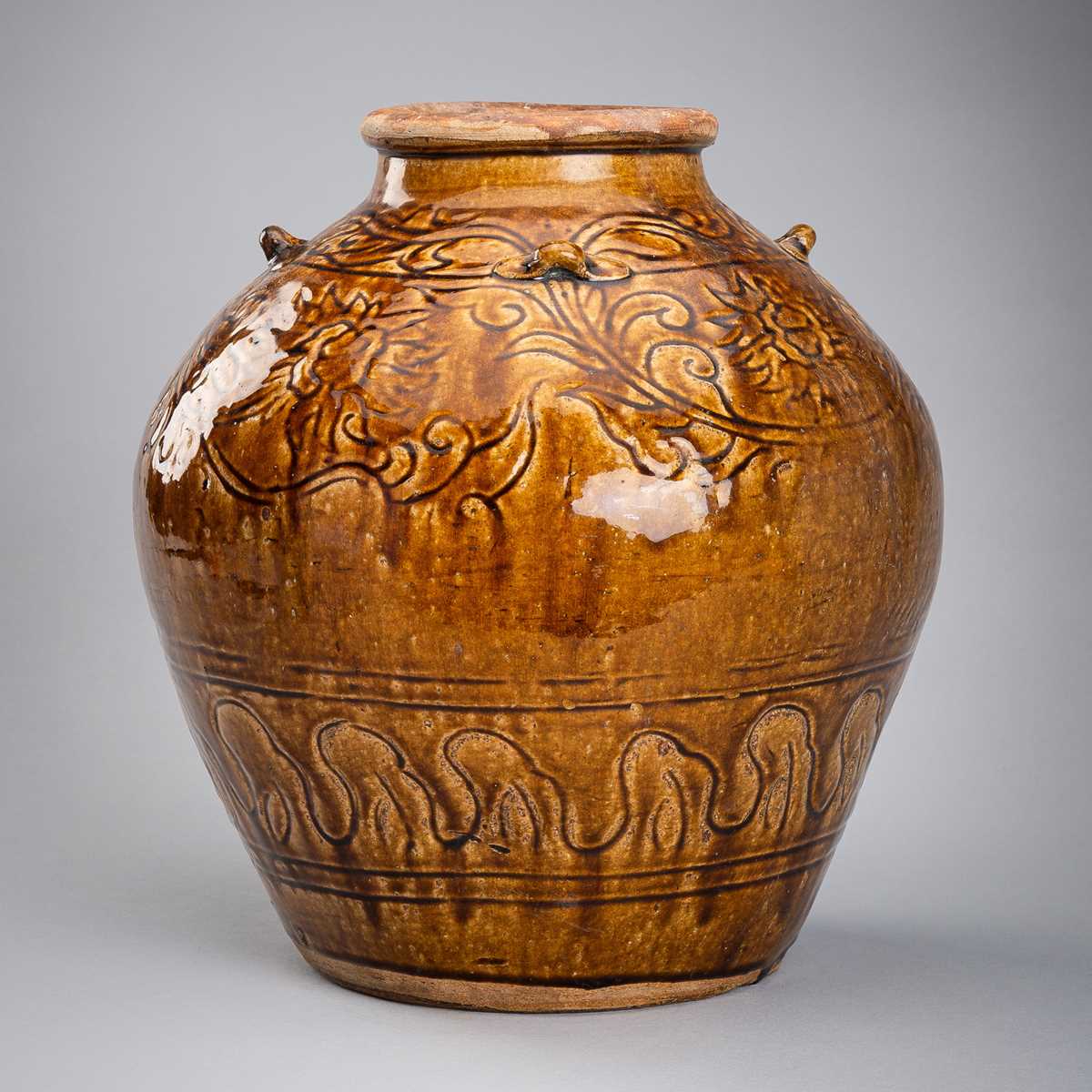 A LARGE, BROWN-GLAZED CERAMIC MARTABAN STORAGE JAR, 19th CENTURY