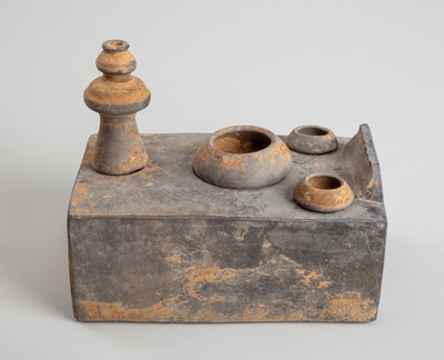 Lot 1175 - A POTTERY MODEL OF A COOKING STOVE, HAN DYNASTY