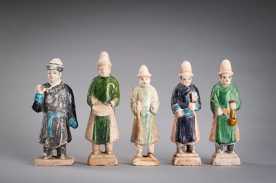 Lot 1235 - A GROUP OF FIVE POTTERY FIGURES, MING DYNASTY