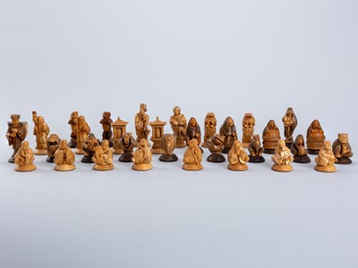 Lot 482 - ALEXANDER DERKACHENKO: A FINE WOOD ‘LEGENDS OF THE EAST’ CHESS SET