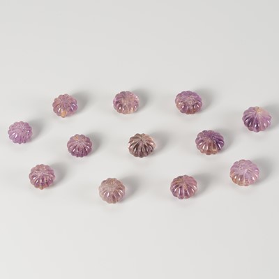 Lot 1607 - A LOT WITH 12 AMETHYST MELON BEADS, 8-12th CENTURY