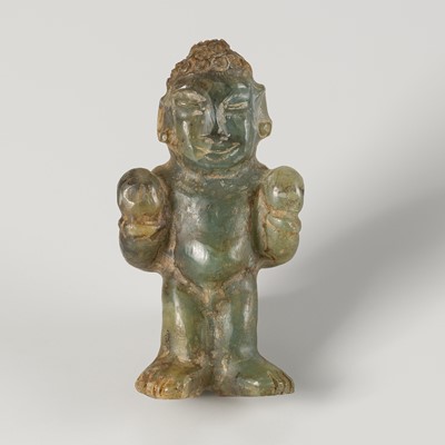 Lot 1657 - A SERPENTINE AMULET OF A BOY, c. 2000 YERS OLD