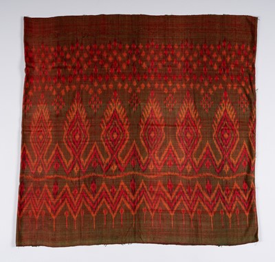 Lot 989 - A KHMER TRIBAL SILK IKAT TEXTILE, 1900s