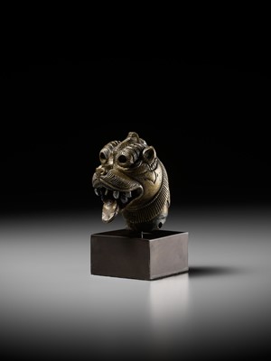 Lot 267 - A RARE PARCEL-SILVERED BRONZE ‘YALI’ HILT, SOUTH INDIA, 17TH-18TH CENTURY