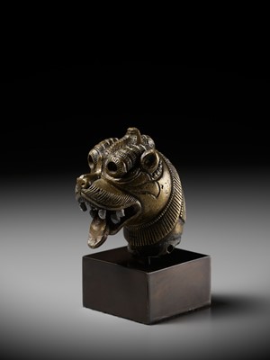 Lot 267 - A RARE PARCEL-SILVERED BRONZE ‘YALI’ HILT, SOUTH INDIA, 17TH-18TH CENTURY