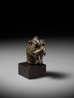 Lot 267 - A RARE PARCEL-SILVERED BRONZE ‘YALI’ HILT, SOUTH INDIA, 17TH-18TH CENTURY