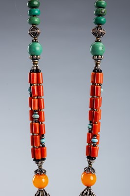 Lot 1064 - A TIBETAN NECKLACE WITH A SILVER PENDANT, c. 1920s