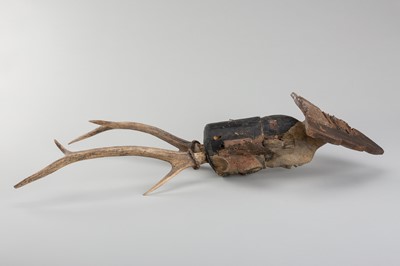 Lot 1518 - A BURMESE WOOD NAT HEAD WITH ANTLER HEADDRESS, 19TH CENTURY